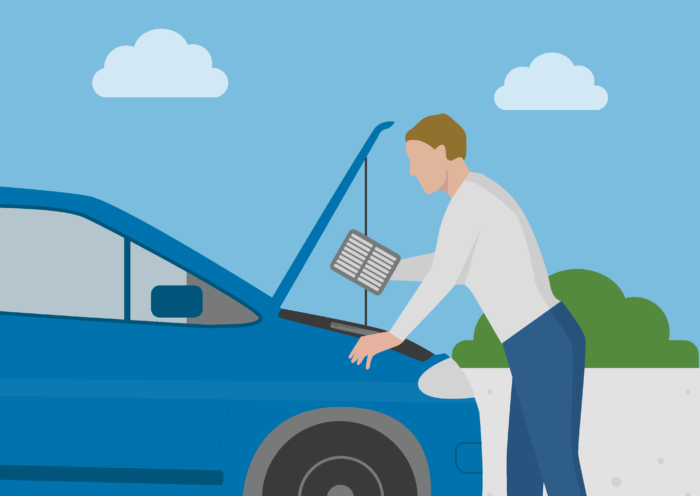  a man changing the air filter in his car to improve emissions