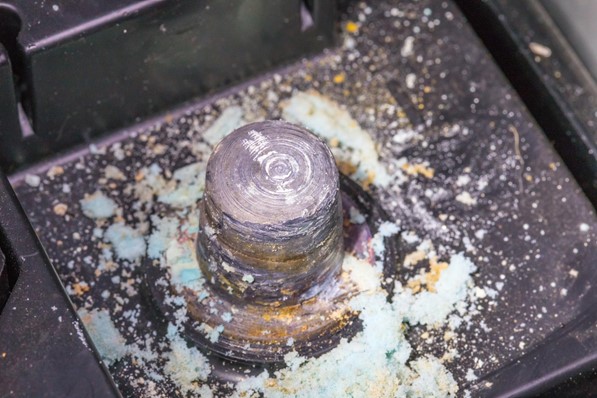 a car battery with corrosion around the terminal that would fail an MOT