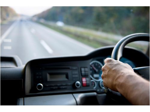 person driving a car on a UK motorway