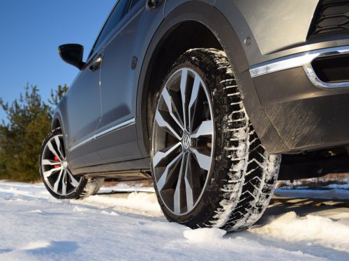 car in the snow with winter tyres on